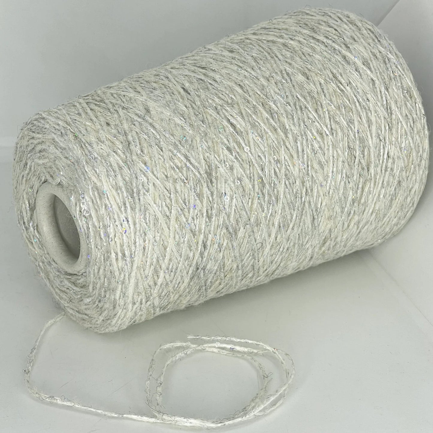 35% Kid Mohair, 35% Merino Wool, 30% Polyester (Sequin)