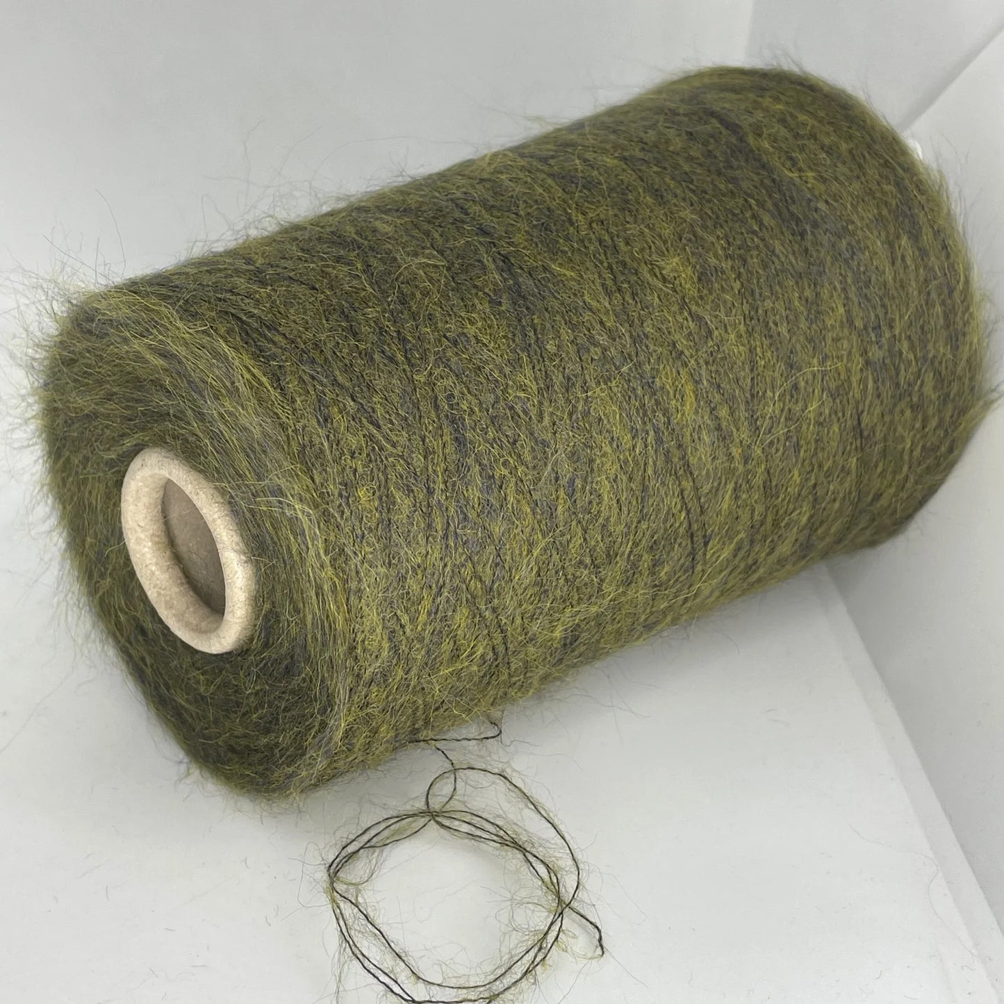 35% Baby Alpaca, 35% Kid Mohair, 30% Polyamide