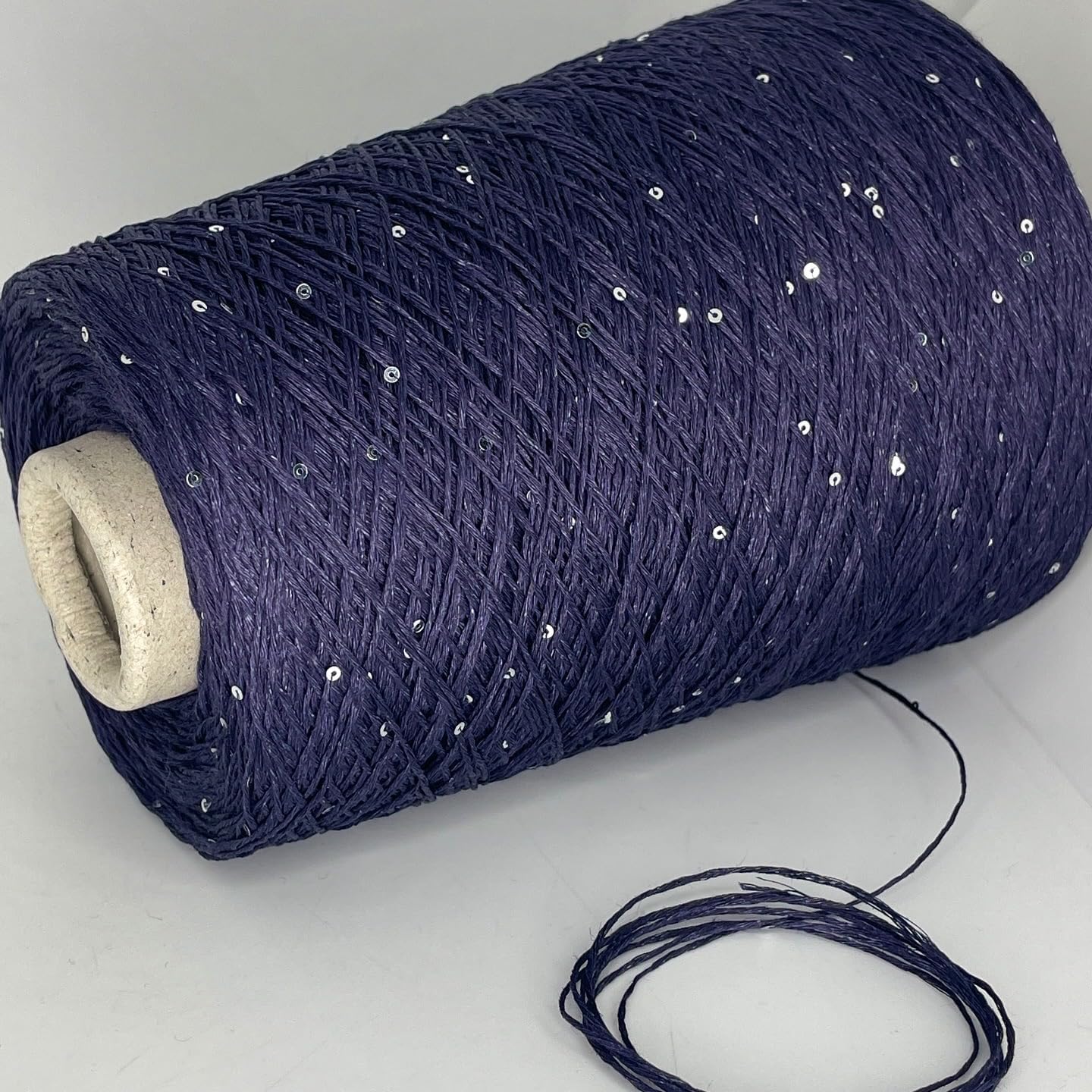 15% Silk, 80% Linen, 5% Polyester (Sequin)
