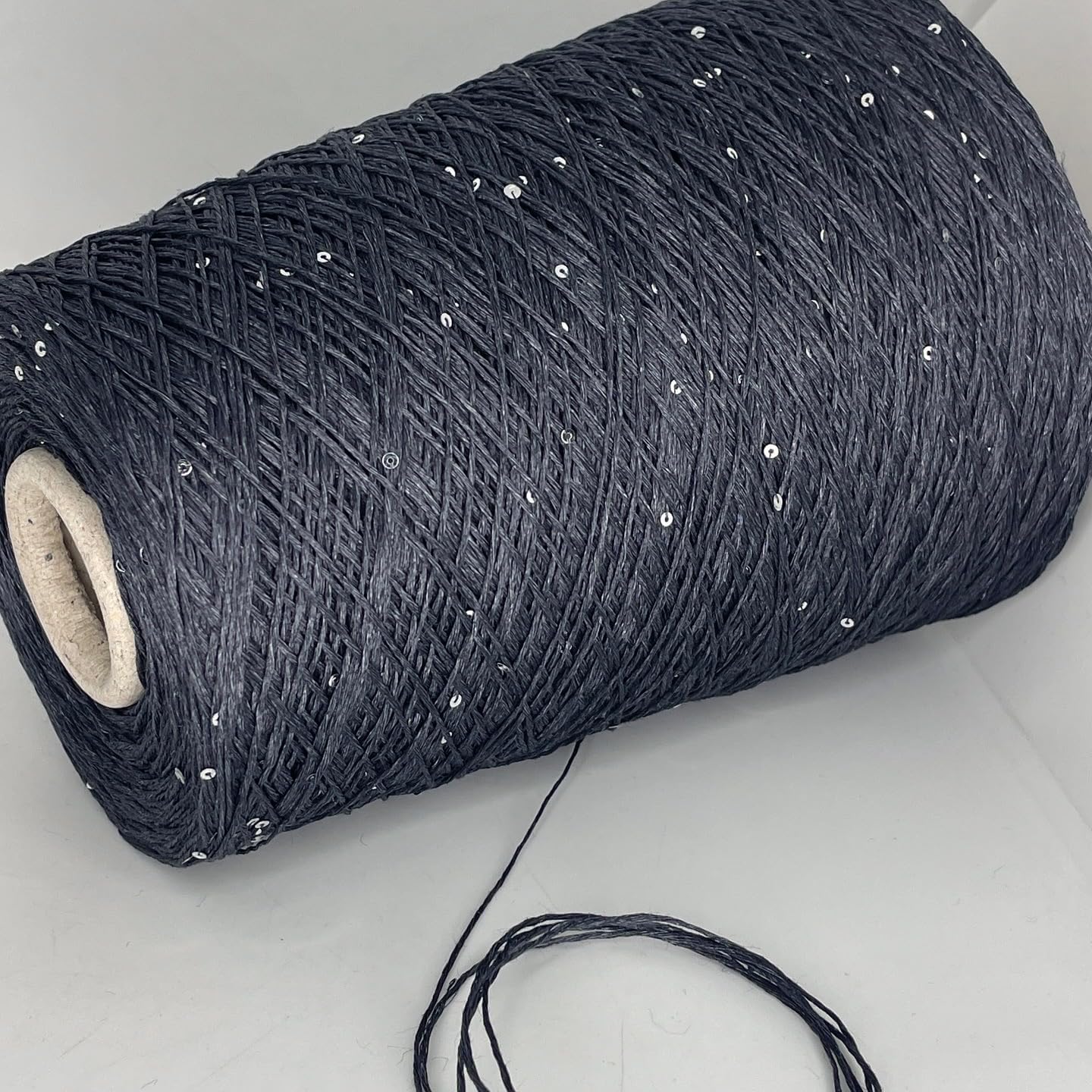 15% Silk, 80% Linen, 5% Polyester (Sequin)