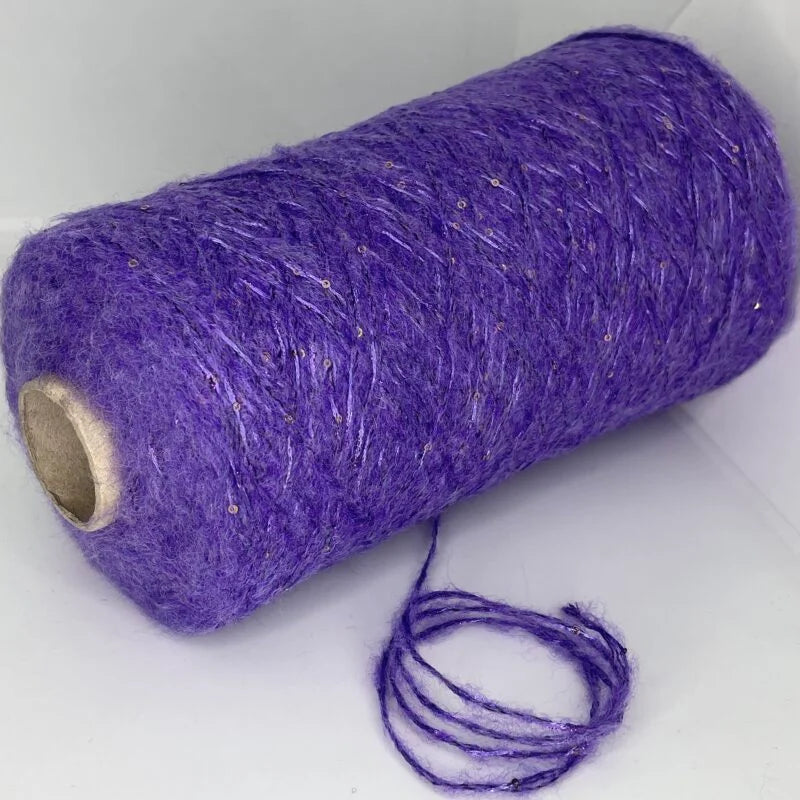 5% Merino Wool, 24% Polyamide, 35% Acrylic, 36% Polyester (Sequin)