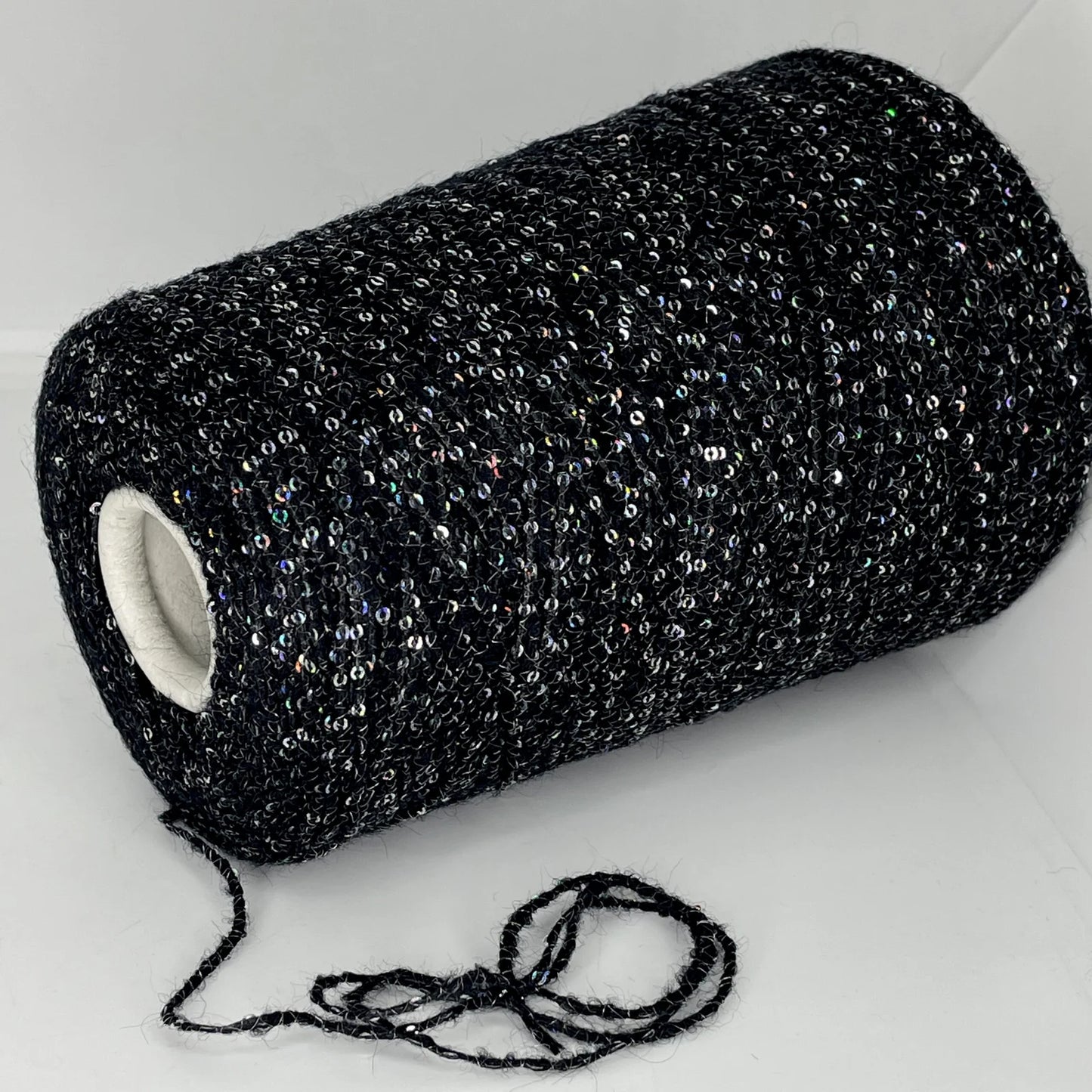 35% Kid Mohair, 35% Merino Wool, 30% Polyester (Sequin)