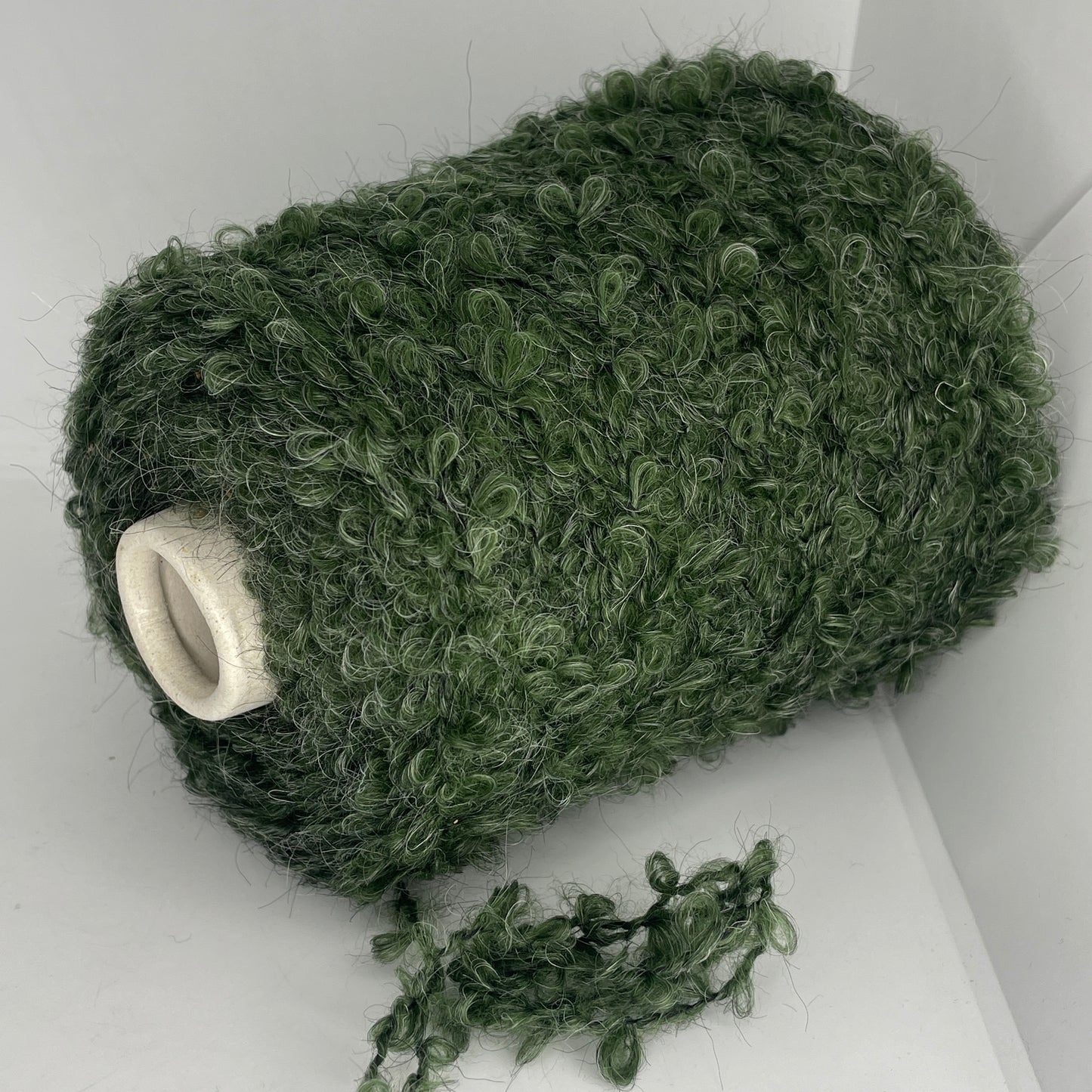 30% Mohair, 22% Merino Wool, 34% Acrylic, 14% Polyester