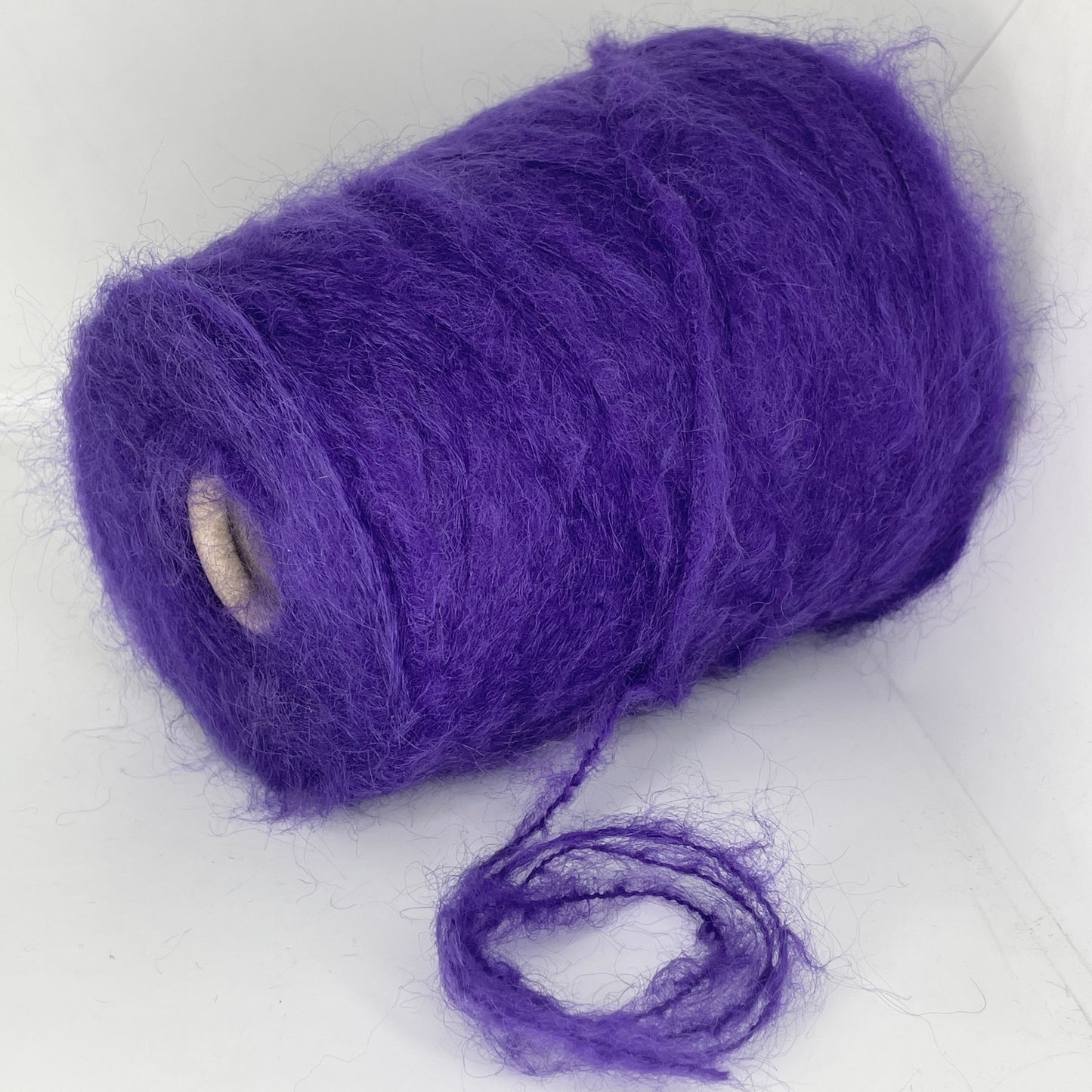 62% Kid Mohair, 38% Polyamide