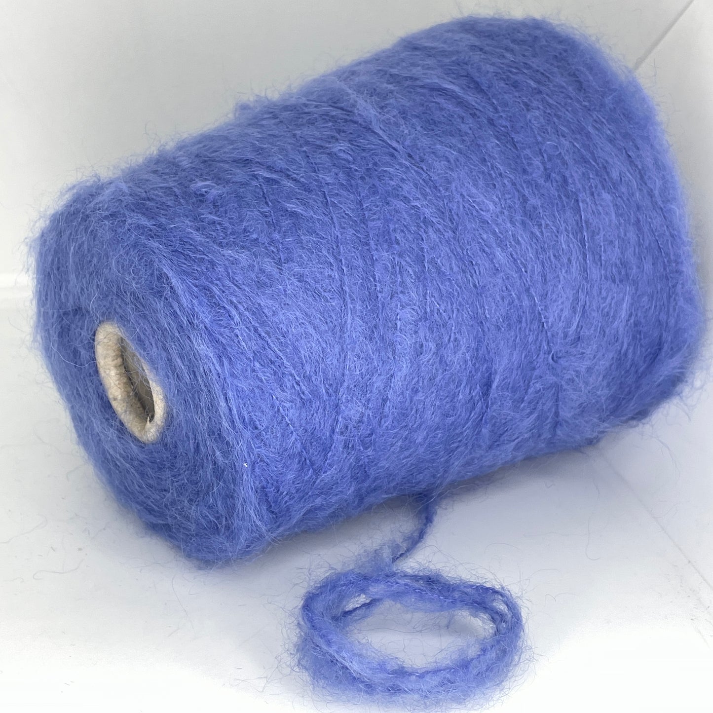 62% Kid Mohair, 38% Polyamide