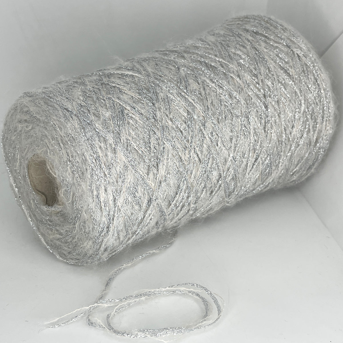 12% Mohair, 32% Polyester, 16% Acrylic, 40% Nylon