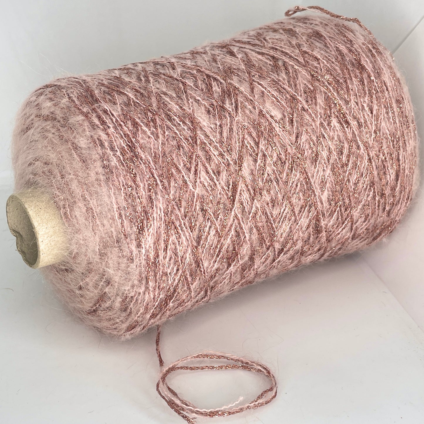 12% Mohair, 32% Polyester, 16% Acrylic, 40% Nylon