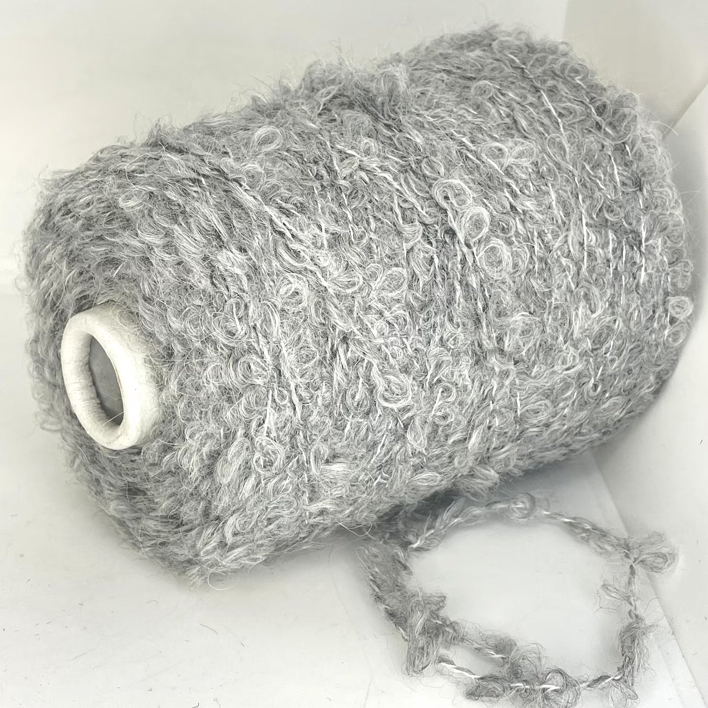 30% Mohair, 22% Merino Wool, 34% Acrylic, 14% Polyester