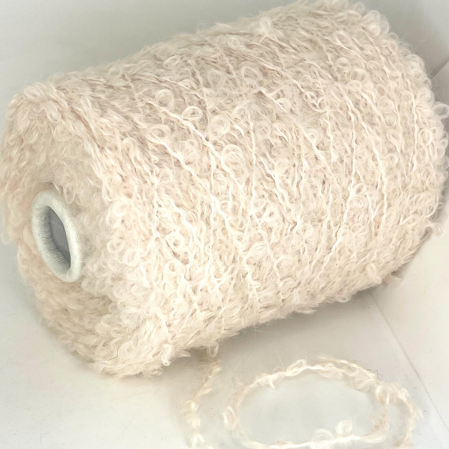 30% Mohair, 22% Merino Wool, 34% Acrylic, 14% Polyester